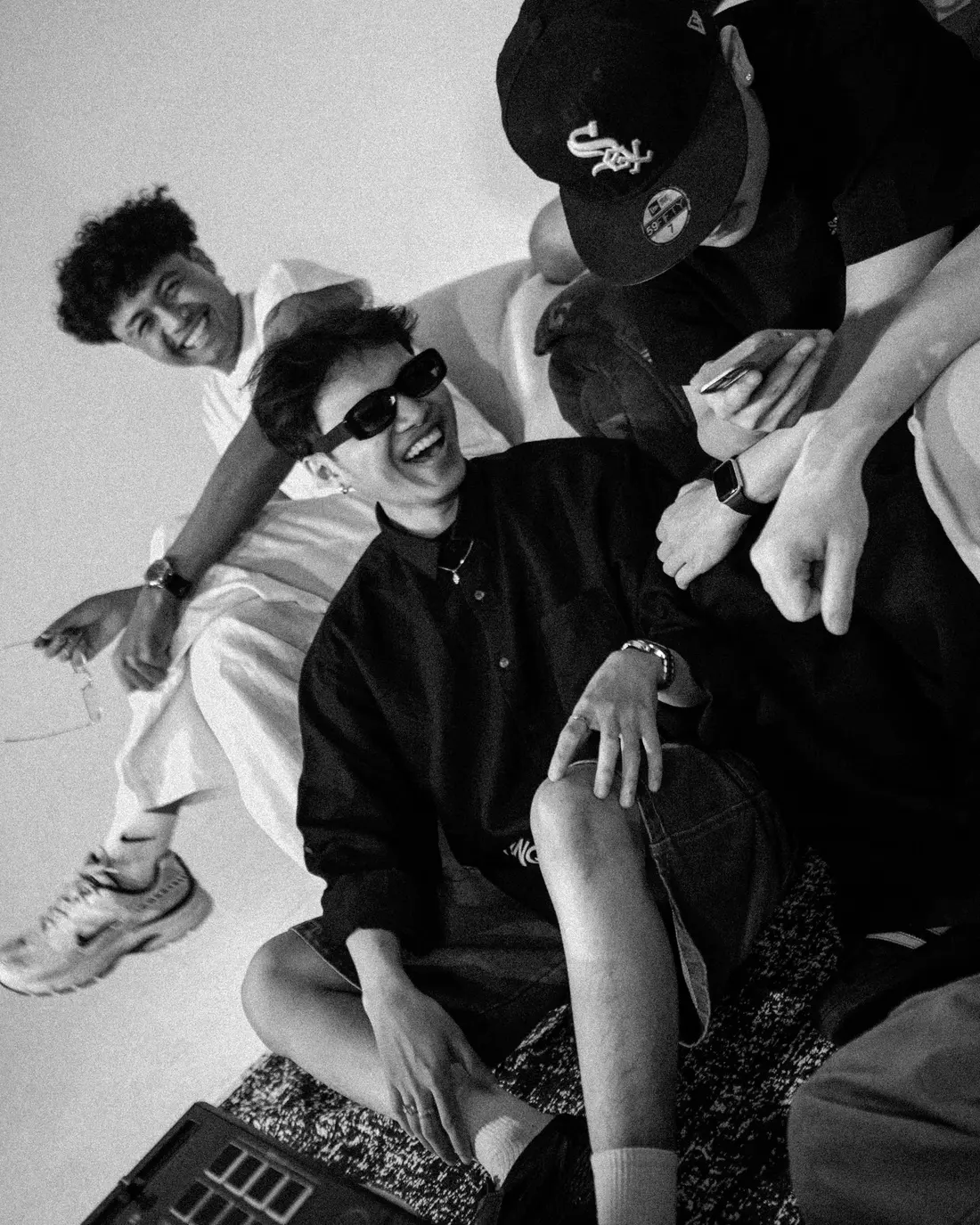 Spinral crew members laughing together in the studio